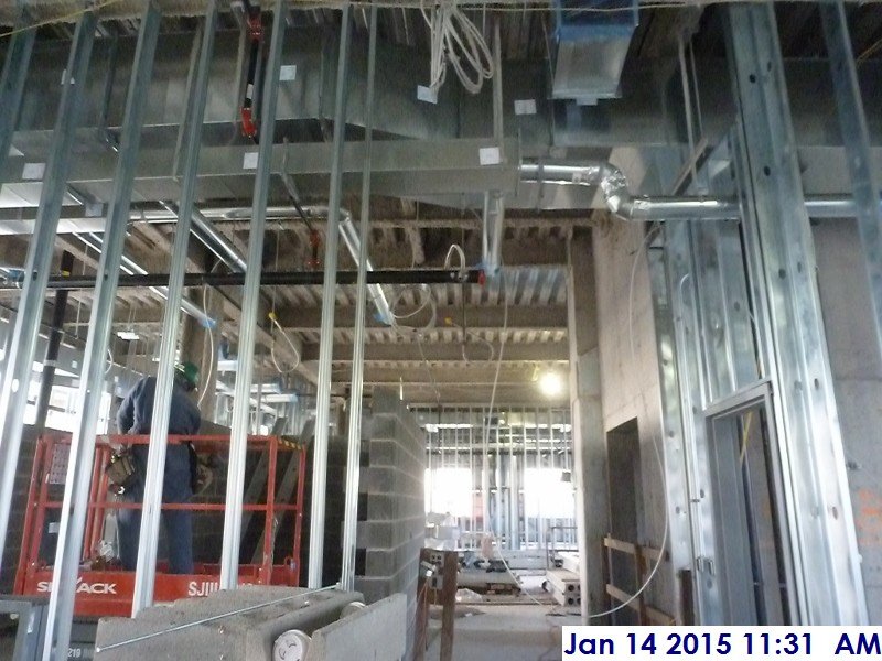 Installing electrical split wire above the ceiling at the 2nd floor Facing West